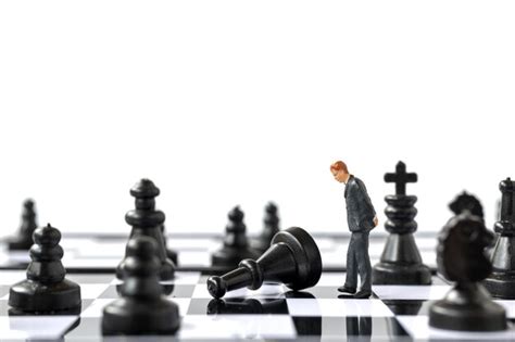 Premium Photo Miniature People Businessman Standing On Chessboard