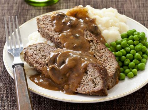 Meatloaf With Mushroom Sauce Mashed Potatoes And Peas Recipe Eat