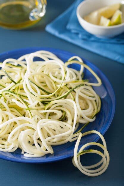 Premium Photo | Spiralized courgette raw vegetable noodles