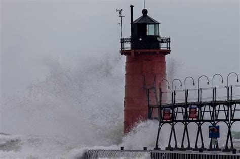 Massive Waves Pummel Lake Michigans Iconic Lighthouses