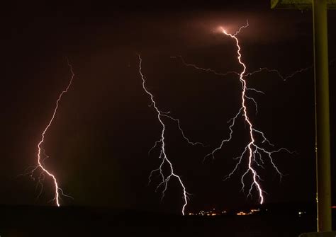 Premium Photo | Dramatic view of lightning strikes at night