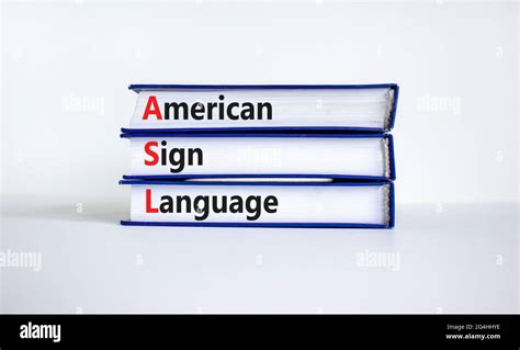 ASL, american sign language symbol. Books with words 'ASL, american ...