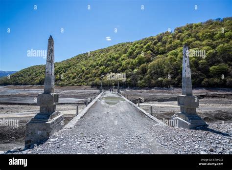 Bridge over Aragvi River near fortifications of medieval Ananuri Castle ...