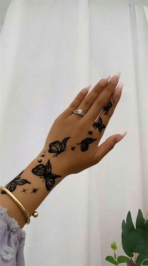 Fluttering Elegance 23 Enchanting Butterfly Henna Designs Wrist To