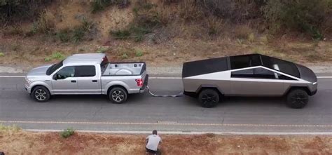 Watch Tesla Cybertruck In Tug Of War Against Ford F150 And Size Comparison Electrek