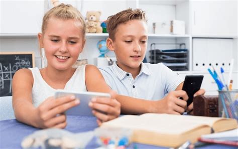 1,794 Children Playing On Their Phone Images, Stock Photos, 3D objects ...