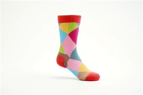 Premium Photo Pair Of Colorful Socks Sitting On Top Of White Floor