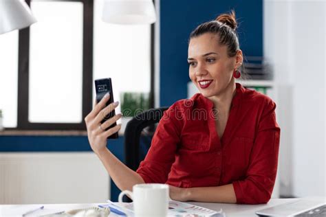 Happy Entrepreneur In Business Corporate Office Taking Selfie Stock