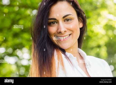 Beautiful Brunette In The Park Stock Photo Alamy