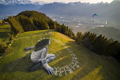 Saype S Coronavirus Themed Grass Graffiti Crowns The Swiss Alps Swi