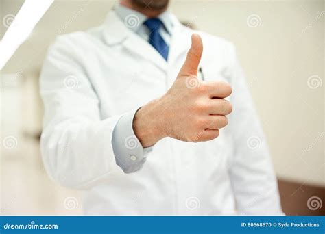 Close Up Of Doctor At Hospital Showing Thumbs Stock Photo Image Of