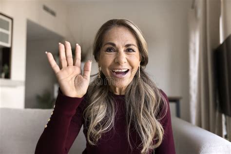 Happy Latina Woman Sit On Sofa Waving Start Videocall Stock Image Image Of Communicate