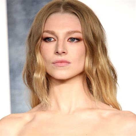 Hunter Schafer Wears A Single Feather As A Bra Top To An Oscars