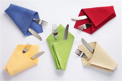 Knife And Fork In Folded Napkin Stock Photo - Image of picnic, knife: 143587400