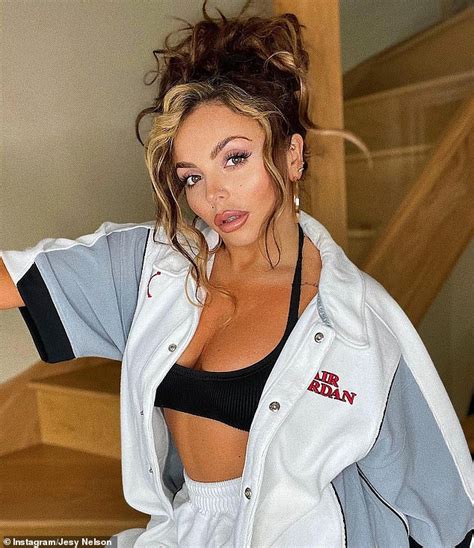 Jesy Nelson Displays Her Taut Midriff In A Black Crop Top And An Air