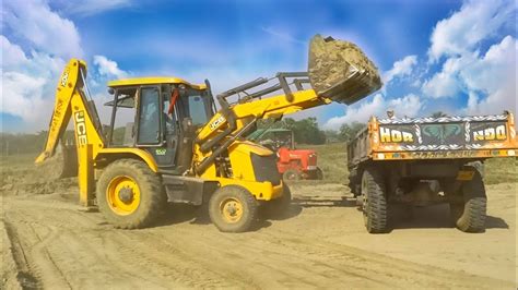 Jcb 3dx Backhoe Loader Machine Loading Red Mud In PowerTrack Plus