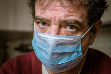 Premium Photo Close Up Portrait Of Man Wearing Mask