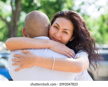 Woman Man Hugging Each Other Parking Stock Photo 2092047823 Shutterstock