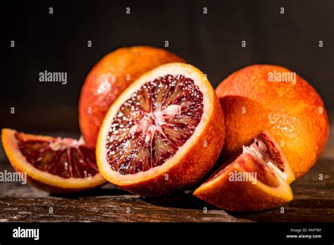 Whole And Cut Ripe Juicy Sicilian Blood Oranges Stock Photo Alamy