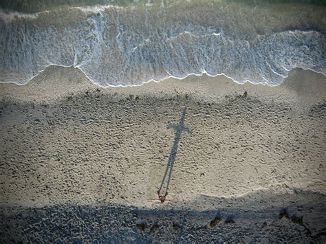 Person Lying Down on Beach · Free Stock Photo