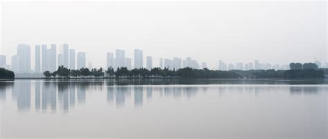 Premium Photo | Panoramic shot of cityscape before sunrise