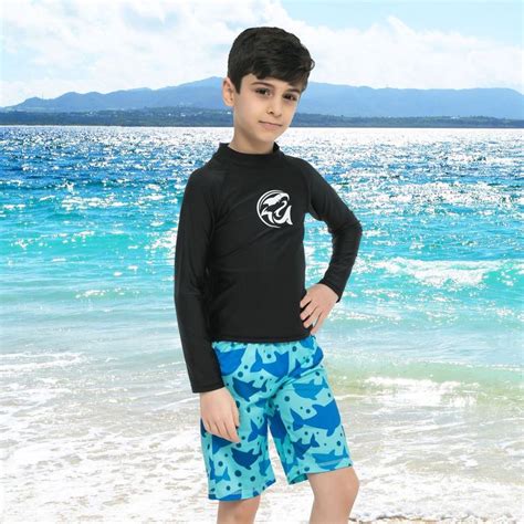 Our long sleeve rash guard for kids features a mock neck and logo ...