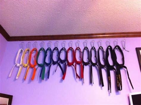 There Are Many Pairs Of Scissors Hanging On The Wall