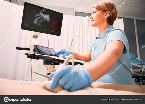 Female Sonographer Examining Woman Ultrasound Scanner Doctor Moving