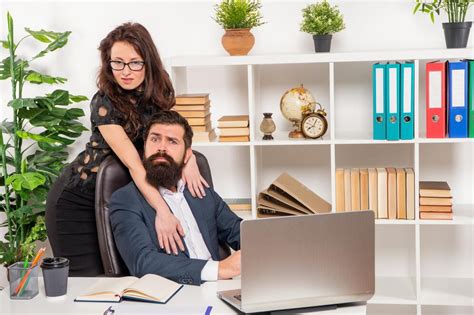 Premium Photo | Acting on her feelings female boss flirting with male