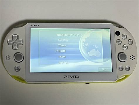 【やや傷や汚れあり】【稼働品】sony Psvita 本体 Pch 2000 ライムグリーンホワイト Playstation 1円〜の落札