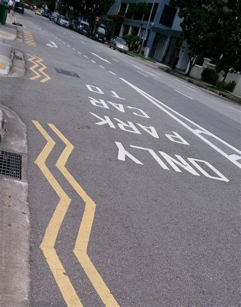 Understanding the parking rules where you see yellow lines 13