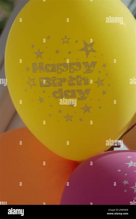 Happy Birthday Decorations in Pink with Balloons Stock Photo - Alamy