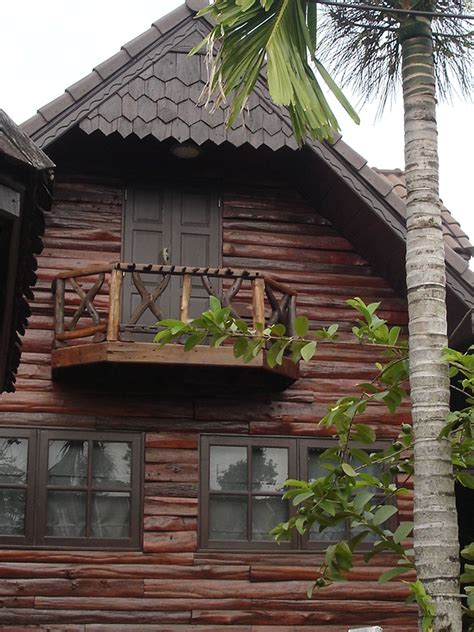 Wood Siding on Earthbag Houses. Wonder if sculpted and stained cob or ...