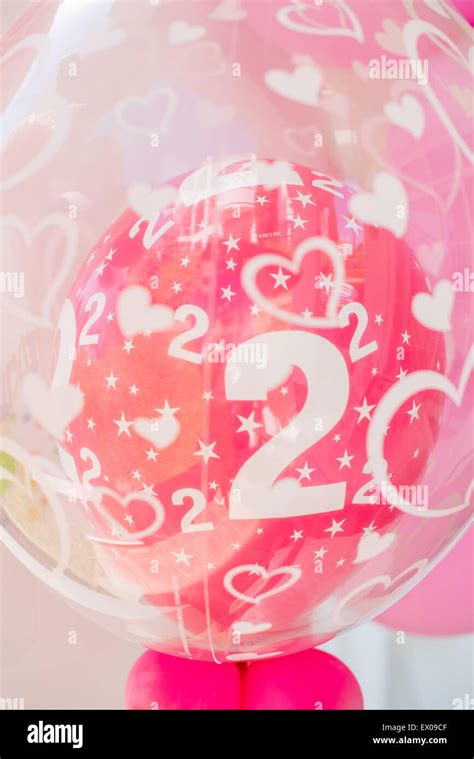 Pink Balloon with Number 2 on it Stock Photo - Alamy