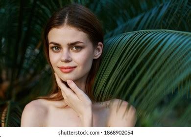 Pretty Woman Naked Shoulders Green Leaves Stock Photo