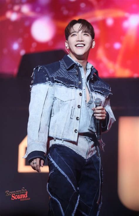 A Male In A Jean Jacket And Jeans On Stage