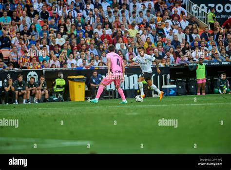 Justin Kluivert Forward of Valencia CF, Cabrera Defender of RCD ...