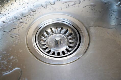 Stainless Steel Sink and Water Drain in a Modern Kitchen, Water Flow in ...