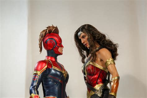 Captain Marvel vs Wonder Woman by AndyReidYoung on DeviantArt