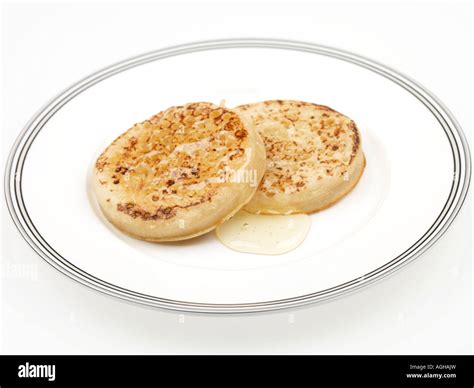 Crumpets with Honey Stock Photo - Alamy