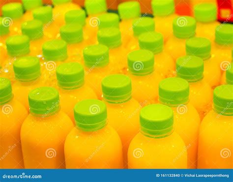 Fresh Orange Or Lemon Juice Packed In Plastic Bottles Ready To Drink