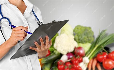 Premium Photo Nutritionist Working In Office Doctor Writing Diet