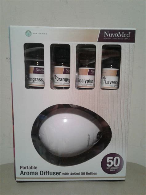 New One Nuvomed Portable Aroma Diffuser W 4 X 5ml Oil Bottles Included