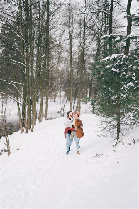 A Couple Hugging in a Winter Landscape · Free Stock Photo