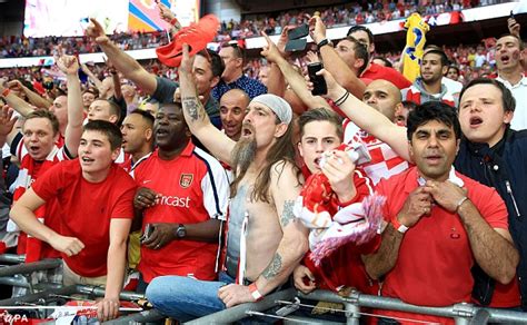 Arsene Wenger Forced To Go Topless After Arsenal Team Soak Him In Beer