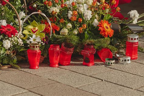 Free picture: Funeral candles with flower arrangement on memorial