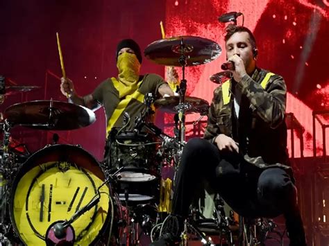 Experience The Excitement Twenty One Pilots Unveil The Clancy World