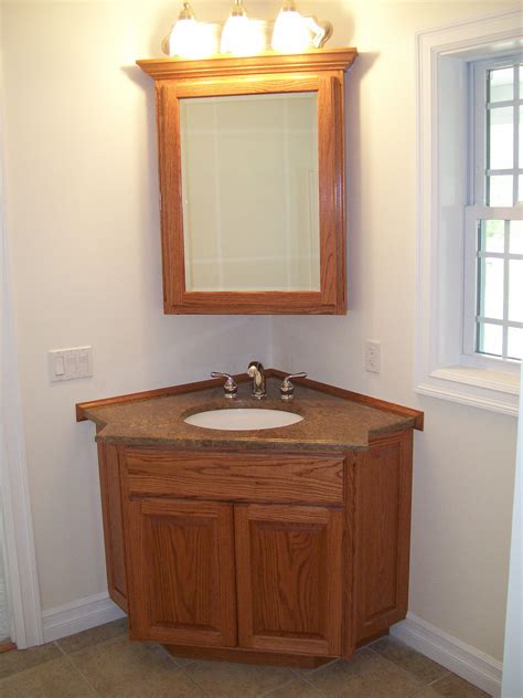 Utilizing Space With A Corner Sink Cabinet - Home Cabinets