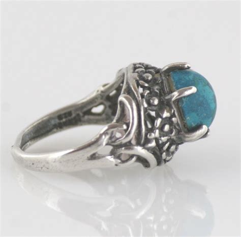 S Ornate Blue Stone And Sterling Silver Claw Sett Gem