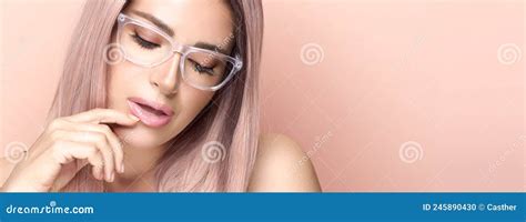 Beautiful Woman Wearing Trendy Nude Glasses Or Eyewear In A Panorama Banner With Copy Space